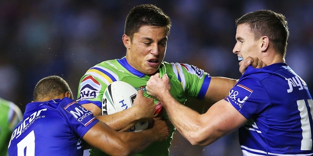 Joseph Tapine, centre, rejected an offer to join the Warriors and chose to develop his skills in Australia. Photo / Getty Images