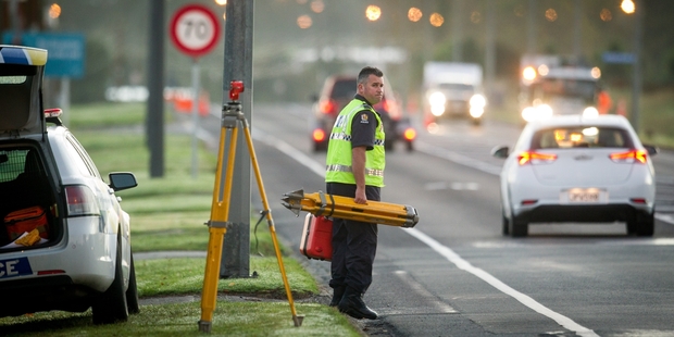 Senior constable Regan Framp mapped out the road as part of an investigation into the death of Eileen Rangituiwa Gardiner. Photo / Stephen Parker