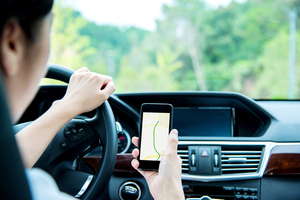 With technology become more sophisticated, it might be time to change the rules on using phones in cars. Photo / iStock