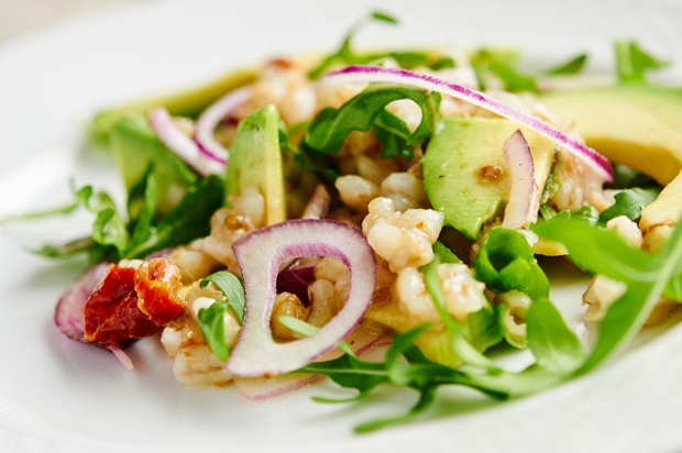 Stocking up on healthy salads and halving portion sizes helped one woman shed weight, despite her lack of exercise. Photo / Getty