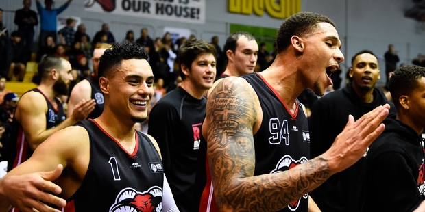The Canterbury Rams celebrate winning an NBL match against the Super City Rangers. Photo / Photosport