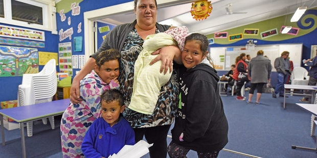 HELPING HAND: Kellie Kioa, with Alilia Kioa, 7, Nikau Kioa, 3, Kelly Lutui, 14 weeks, and Taya Kioa, 9.PHOTO/GEORGE NOVAK