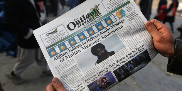 The leader of the Afghan Taliban, Mullah Mansour, is shown in a newspaper in Kabul, Afghanistan in 2015. Photo / AP