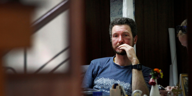 Australian climber Dr Robert Gropels who was rescued from Mount Everest sits in his hotel room in Kathmandu. His wife Dr Maria Strydom, 34, died near the top. Photo / AP