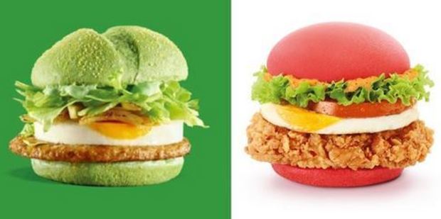 Featuring either red or green food colouring in the buns, the latest McD's creations have been met with mixed opinions from fans. Photo / Twitter