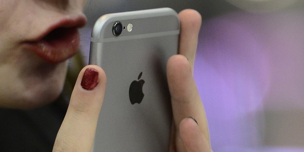 Apple's been managing to make large enough changes to the iPhone to keep sales up, unlike its predecessor, BlackBerry. Photo / Getty Images