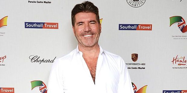 Simon Cowell admitted Eric will feature in the book, while there will also be a character based on himself. Photo / Getty Images