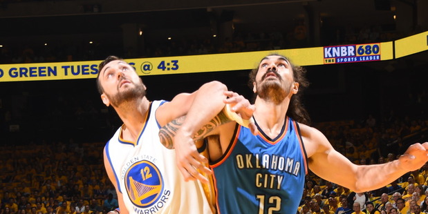 Andrew Bogut and Steven Adams jostle for position. Photo / Getty Images