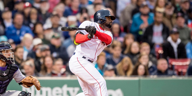 Jackie Bradley Jr. hits a double during a game against the Colorado Rockies. Photo / Getty Images
