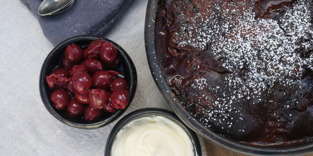 Chocolate cherry self saucing pudding. Photo / Doug Sherring