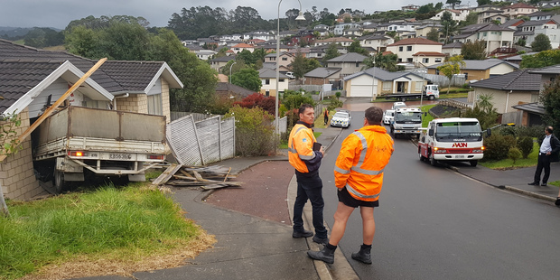 Police said the truck suffered handbrake failure and veered into the brick home. Photo / Daniel Hines