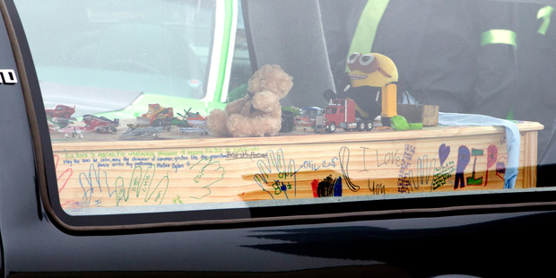 Alex Fisher's casket adorned with messages. Photo / Mark Mitchell