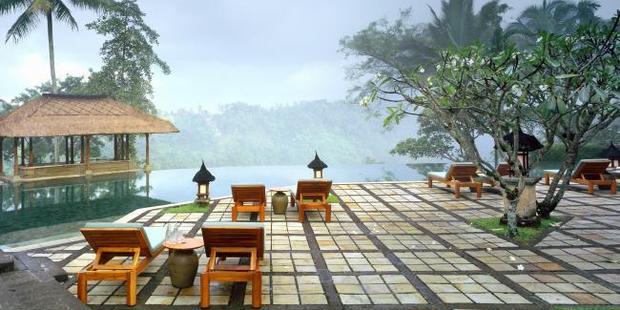 Mist over the valley at the Amandari infinity pool. Photo / Ian Lloyd Neuabauer