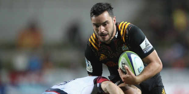 James Lowe and the Chiefs blitzed the Rebels in the first half of their win. Photo / Getty Images