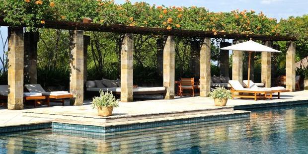 The Bougenvilia covered trellis bordering the Amanusa quadrangle pool. Photo / Ian Lloyd Neubauer