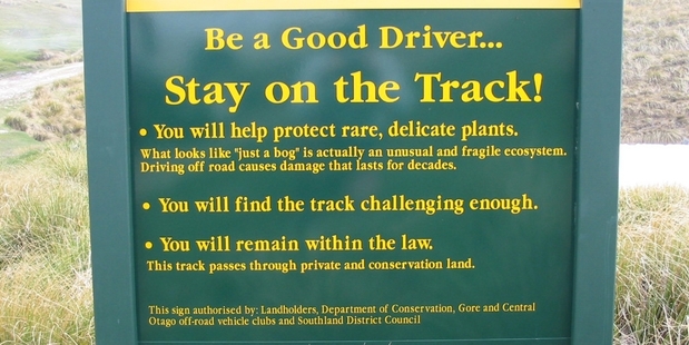 Signs on the Waikaia Bush Rd warn that it's a dry-weather road and conditions can change. Photo / DOC