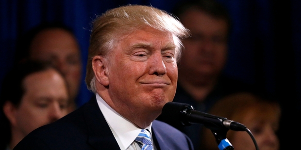 Donald Trump fired back at Barack Obama in characteristic fashion, saying 'when you rattle someone, that's good'. Photo / AP