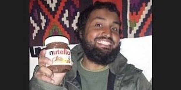 A jihadist with a jar of the popular chocolate spread.