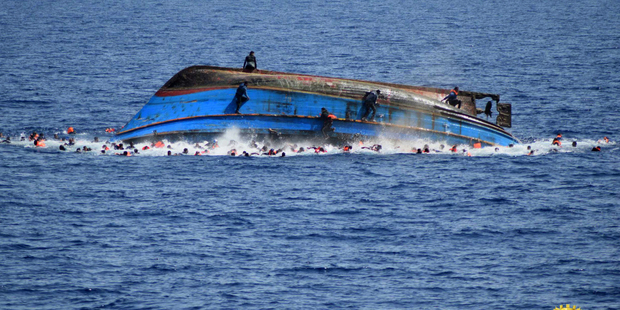 The Italian navy says it has recovered 7 bodies from the overturned migrant ship. Photo / Marina Militare via AP Photo
