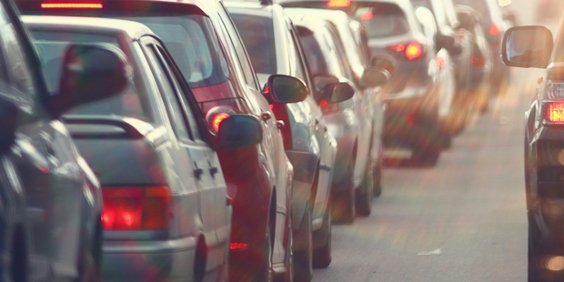 The signs can change configuration quickly to create an extra lane during peak hour traffic. Photo / iStock