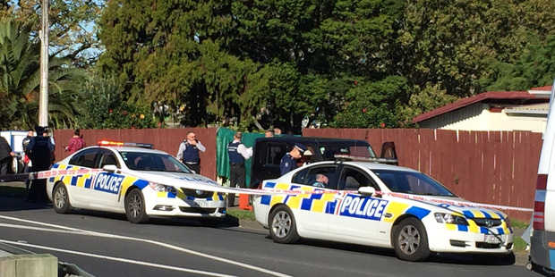 Police at Favona Road where a child was shot. Photo / Susan Strongman