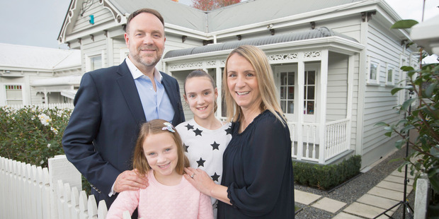 Breadwinner and advertising executive Craig McCann, with wife Luci McCann and daughters, Isla, 8, and Evie, 11, at their Herne Bay home. Picture / Nick Reed