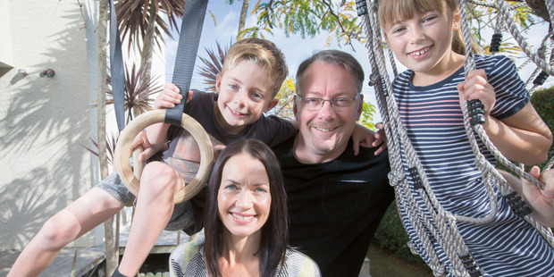 Breadwinner Frank Mair, with wife Vicky Mair and their children, Marlon, 7, and Ruby, 9, at their Herne Bay home.
Picture / Nick Reed