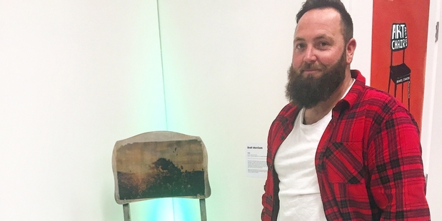 ART TO INSPIRE ACTION: Brett Morrison with the chair he made for Bowel Cancer New Zealand and the awareness month of June.