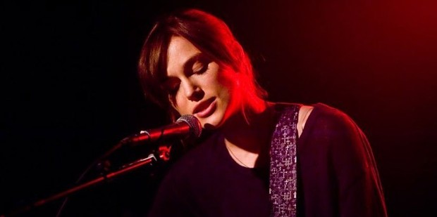 Keira Knightley in her 2014 film, Begin Again. The director of the film has apologised for criticising Knightley's performance.