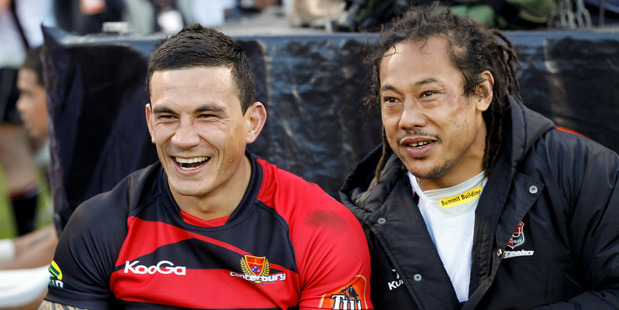 Sonny Bill Williams and Tana Umaga share a joke as they watch their Canterbury and Counties Manukau teams clash during an ITM Cup match in 2010. Photo / Getty Images