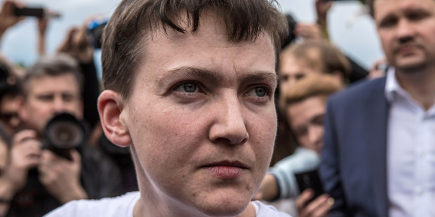 Ukrainian military pilot Nadiya Savchenko is surrounded by media upon her arrival at Kyiv Boryspil Airport on May 25, 2016 in Boryspil, Ukraine. Photo / Getty