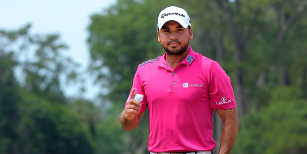 Jason Daywaves his golf ball during the final round of THE PLAYERS Championship. Photo / Getty Images