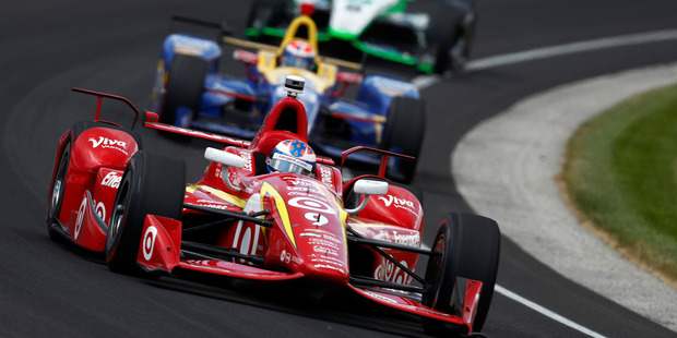 Scott Dixon leads a pack of cars during the 100th running of the Indianapolis 500. Photo / Getty Images