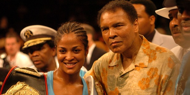Muhammad Ali with his victorious daughter Laila. Photo / Getty Images