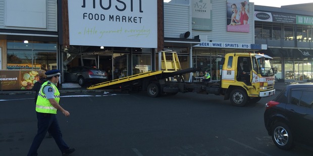 A car has driven into the front window at the Nosh food store in Glenn Innes. Photo / Supplied