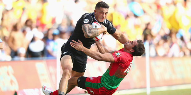 Sonny Bill Williams bumps out of the tackle from Tiago Fernandes of Portugal during the 2016 Sydney Sevens. Photo / Getty Images