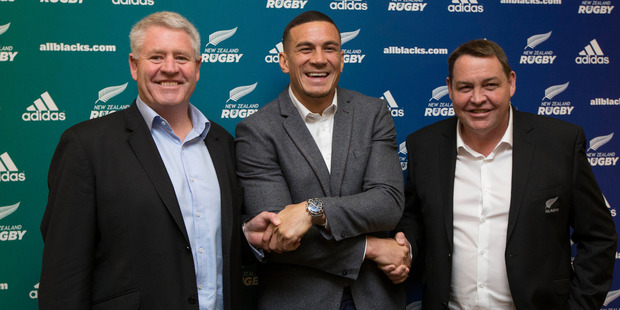 Three way handshake - Sonny Bill Williams with New Zealand Rugby CEO Steve Tew and All Blacks coach Steve Hansen. Photo / Brett Phibbs