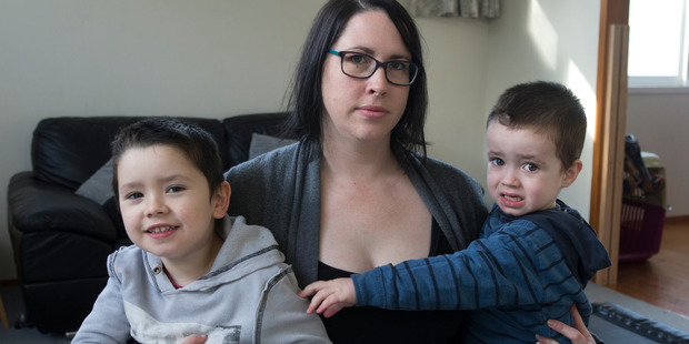 Kim Hall with Vinny, aged 4, left, and Eddie, 2, at her home in Miramar, Wellington. Vinny is autistic and Eddie has a social phobia. Photo / Mark Mitchell
