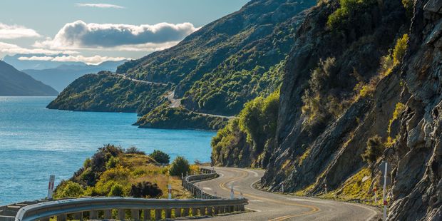 The road alongside Lake Wakatipu delivers stunning views.