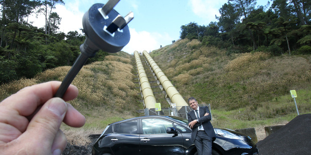 Real estate agent Ross Brown has a Nissan Leaf, an all electric vehicle. Photo/John Borren