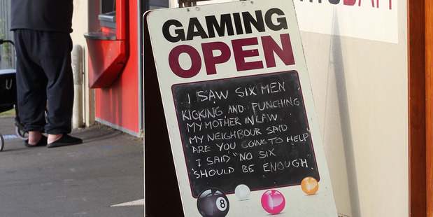 The offending blackboard outside The Elbow Room Sports Bar owner in Hastings.