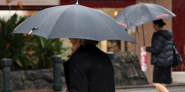 A moment of umbrella kindness can make someone's day.