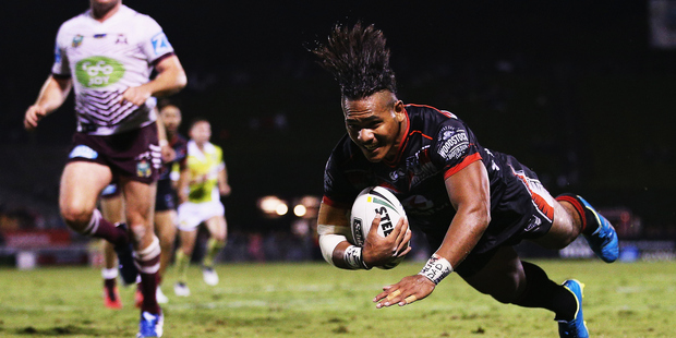 Solomone Kata of the Warriors dives over to score a try. Photo / Getty Images