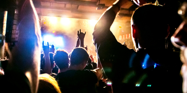 I feel guilty about being tall at concerts all the time. Photo / iStock