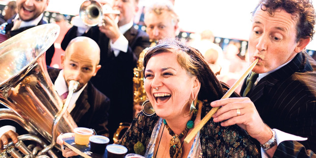 Roving bands, like the Ale Capones, provide entertainment during the festival.
