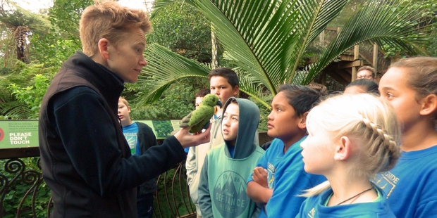 Auckland Zoo educator Kirsty MacFarlane engages Year 6 Morningside School students, from left, Nikau Heke, Zac Withers, JJ Wellington, Kyra Dodd and Eva Winch in the Te Wao Nui precinct during their Warehouse Zoofari last week.