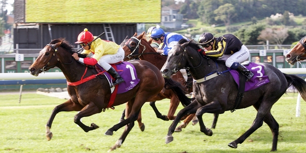 Fire Jet, with Doni Prastiyou in the saddle, narrowly holds on from the fast-closing Battle Time. Photo / Trish Dunell