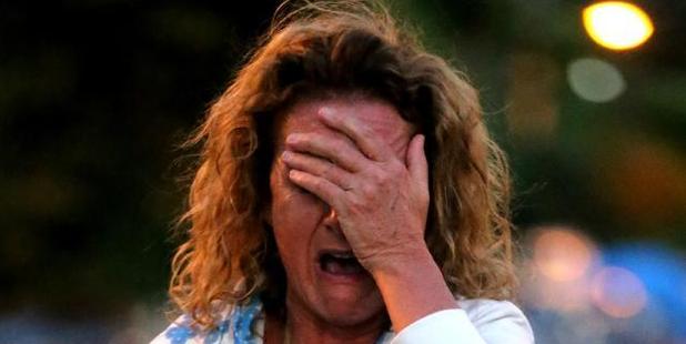 Zaza Silk breaks down after freak waves destroyed her pool. Photo / News Corp Australia / John Grainger