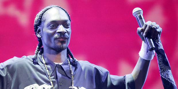 Snoop Dogg gets a work out in his latest video for the song Kush Up. Photo/AP