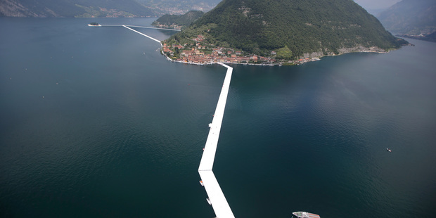 An aerial view of the in-progress installation 'The Floating Piers' by Bulgarian artist Christo Vladimirov Yavachev known as Christo, on the Lake Iseo, northern Italy. Photo / AP
